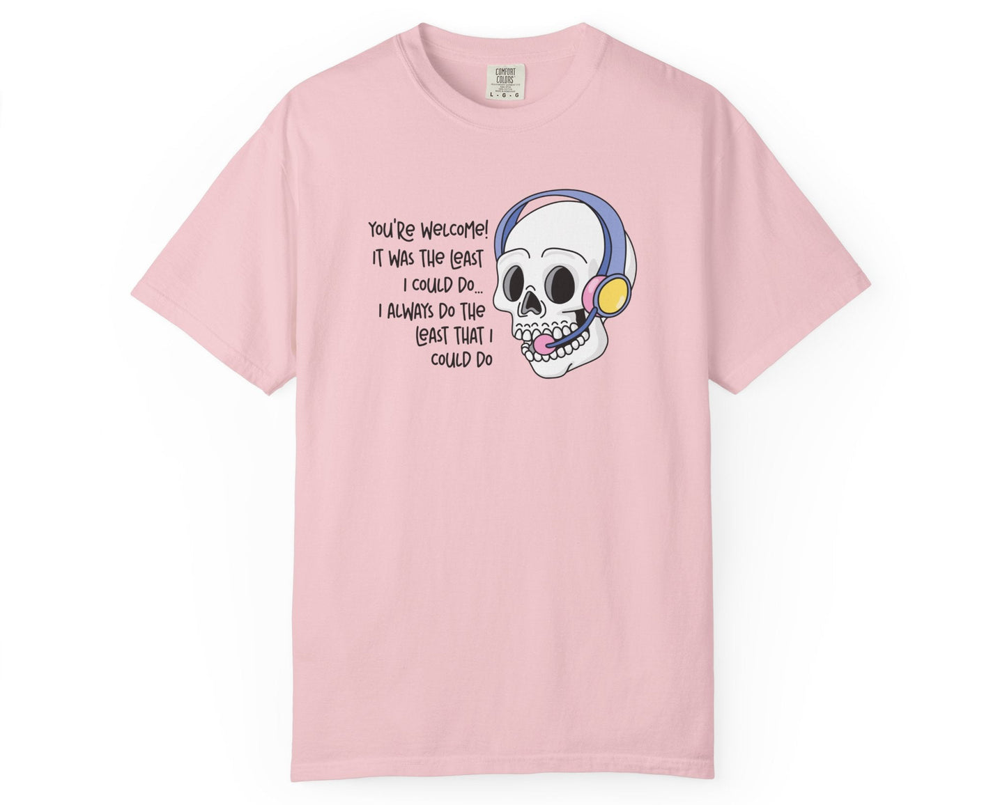 Pink t-shirt with a cartoon skull design and text on a white background