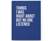 Blue notebook with white text on a white background