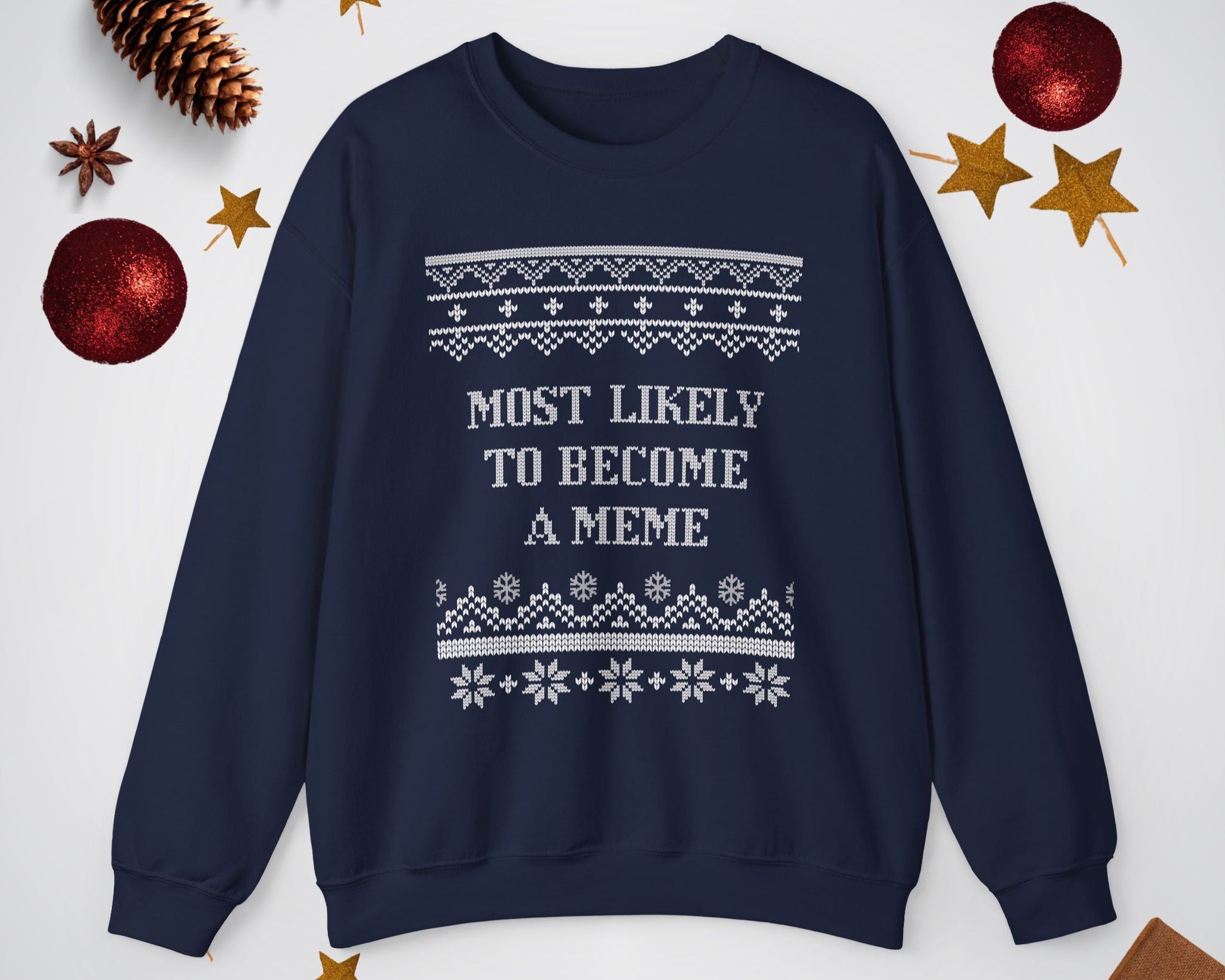 Navy blue sweatshirt with white text and patterns on a light gray background with decorative items.