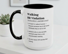 Mug with humorous definition text on a white surface with a plant in the background