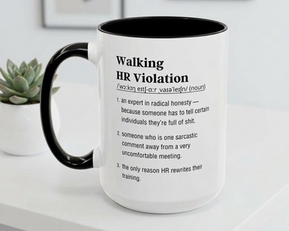 Mug with humorous definition text on a white surface with a plant in the background