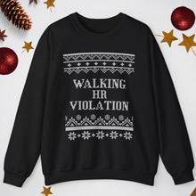 Black sweater with 'Walking HR Violation' text on a white background with Christmas decorations.
