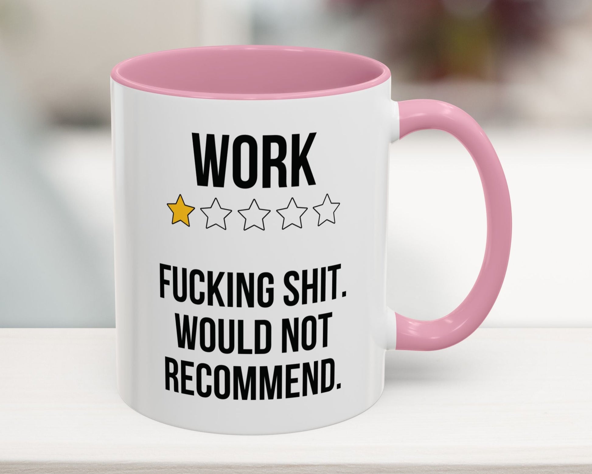 White mug with pink interior and handle featuring a humorous rating system and text.