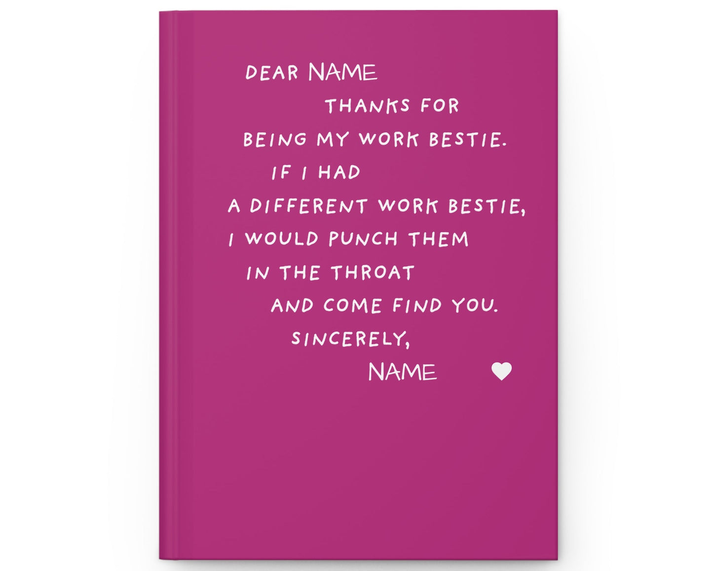 Pink notebook with white text on a white background