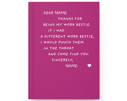 Pink notebook with white text on a white background