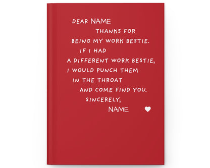 Red notebook with white text on a white background