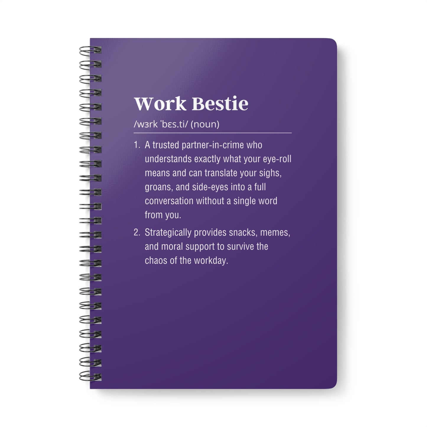 Purple notebook with text definition on a white background