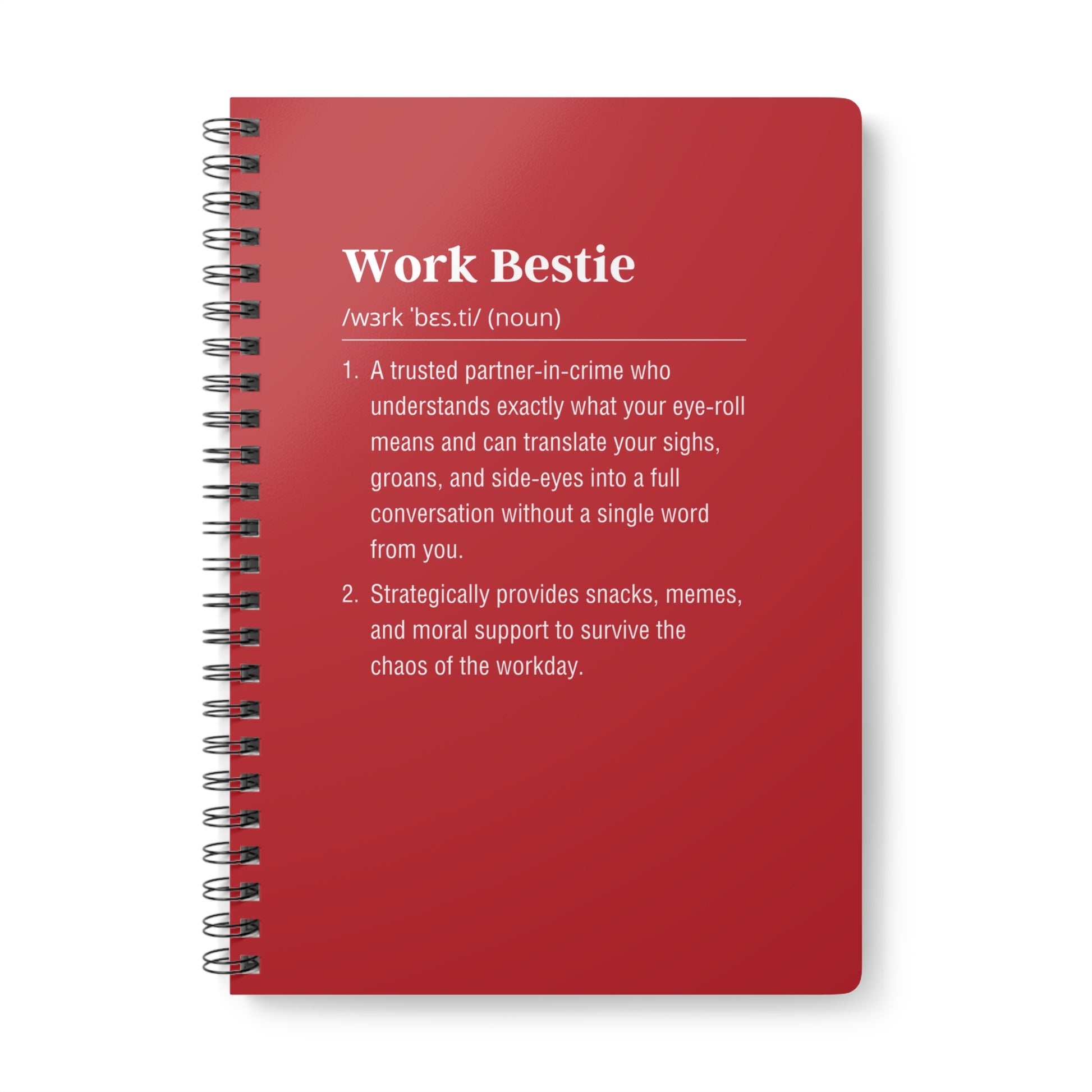 Red notebook with 'Work Bestie' definition on a white background