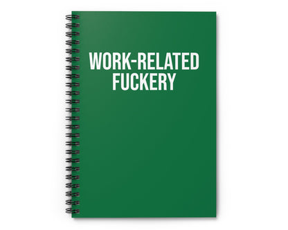Green notebook with 'WORK-RELATED FUCKERY' text on a white background