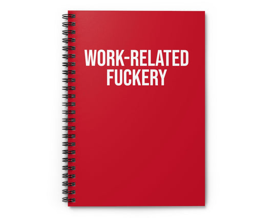 Red notebook with 'WORK-RELATED FUCKERY' text on a white background